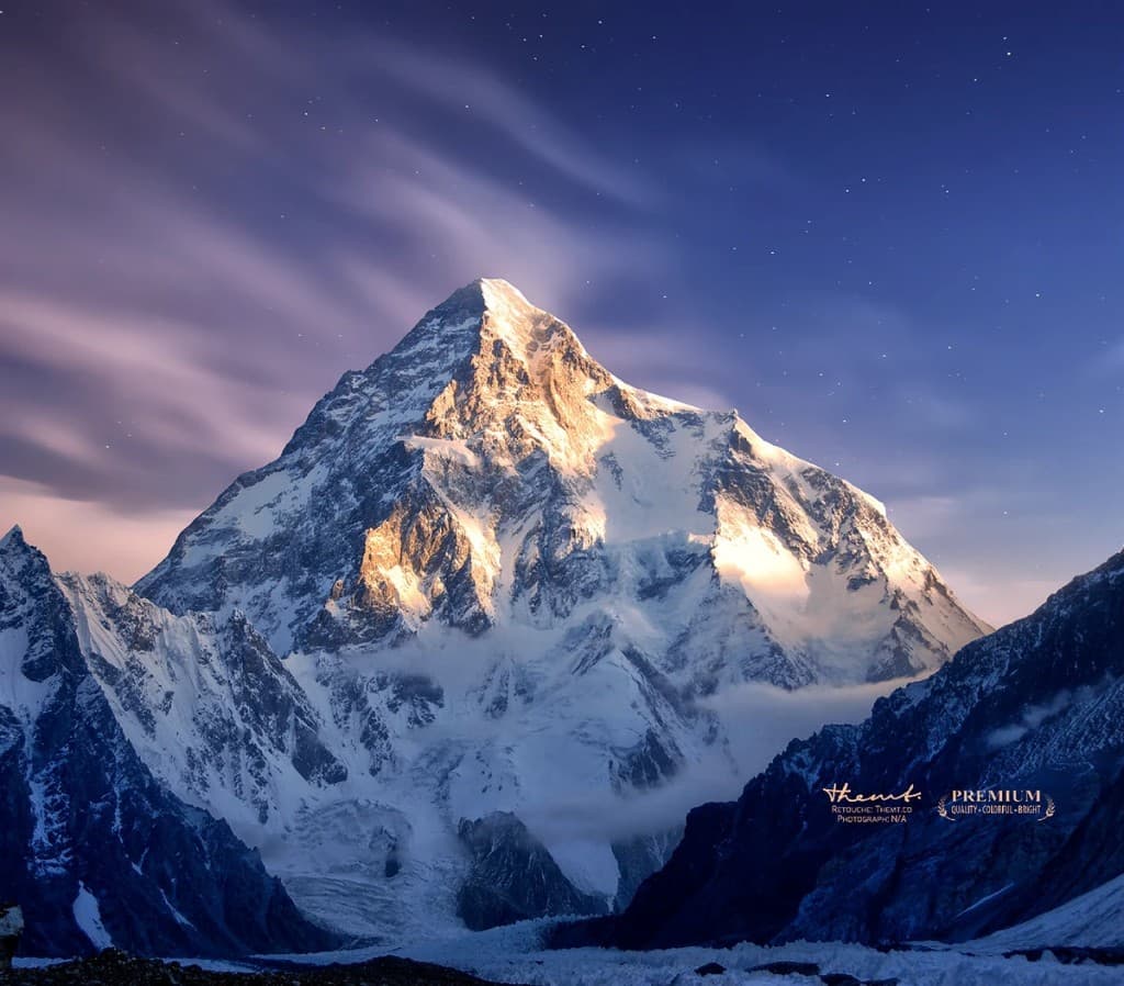 Snowcapped mountain under a twilight sky